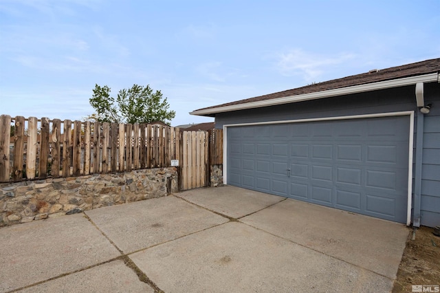 6798 Flower St, Reno, NV 89506 - garage with fence