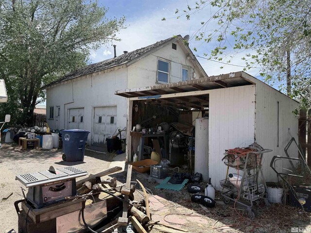 100 Dalton St, Fallon, NV 89406 - rear view of property featuring a pole building and an outbuilding
