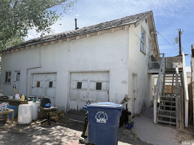 100 Dalton St, Fallon, NV 89406 - view of home's exterior with stairway and stucco siding