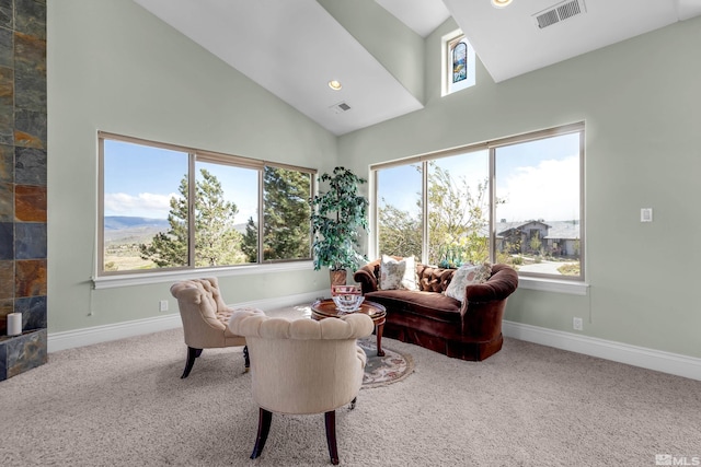 10401 Copper Cloud Dr, Reno, NV 89511 - living area featuring high vaulted ceiling, plenty of natural light, carpet, baseboards, and recessed lighting