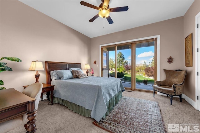 10401 Copper Cloud Dr, Reno, NV 89511 - carpeted bedroom with access to exterior, ceiling fan, lofted ceiling, and baseboards