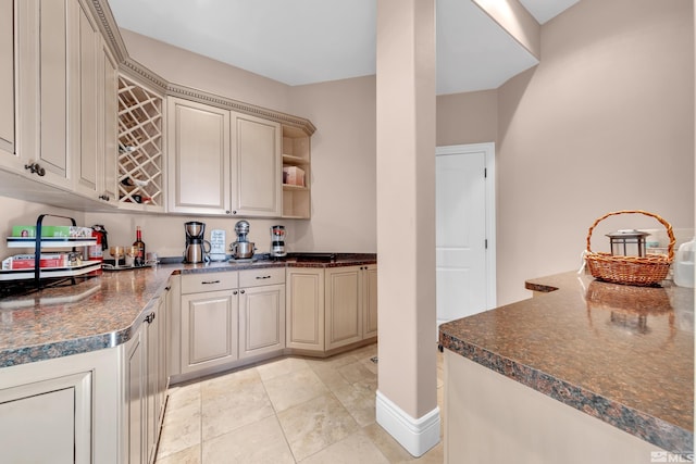 10401 Copper Cloud Dr, Reno, NV 89511 - kitchen with dark countertops, open shelves, and light tile patterned flooring