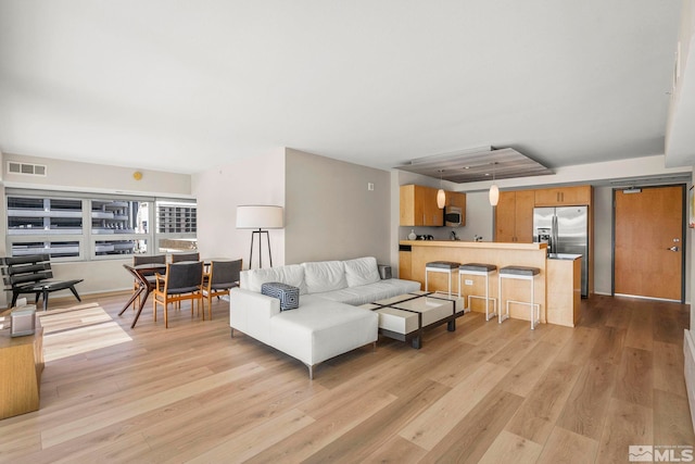 living room with light wood finished floors
