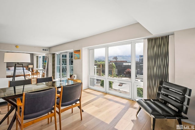 dining room with light wood-type flooring