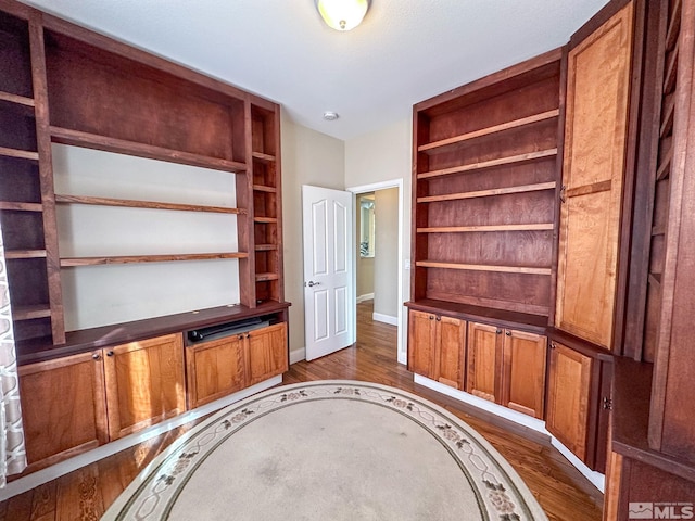 470 Miesque Ct, Reno, NV 89521 - unfurnished office with dark wood-style flooring and baseboards