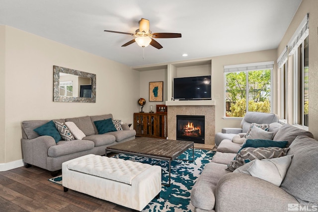 2963 Moose Ridge Dr, Reno, NV 89523 - living room with dark wood-style flooring, ceiling fan, a tiled fireplace, baseboards, and recessed lighting