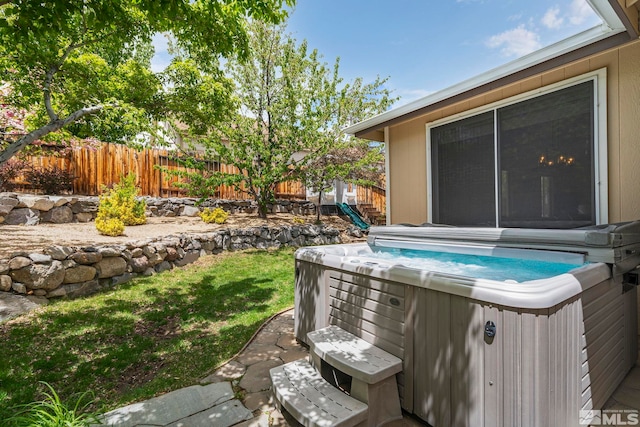 2963 Moose Ridge Dr, Reno, NV 89523 - view of yard featuring a hot tub and fence