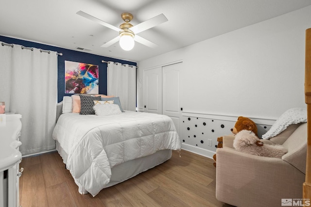 2963 Moose Ridge Dr, Reno, NV 89523 - bedroom with wood finished floors, a closet, and ceiling fan