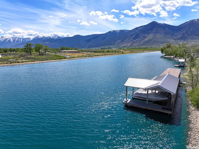 2980 N US Highway 395, Minden, NV 89423 - water view featuring a mountain backdrop and a dock