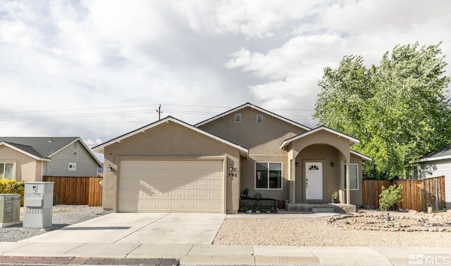 391A Bens Way, Fernley, NV 89408 - view of front of house with an attached garage, stucco siding, and driveway