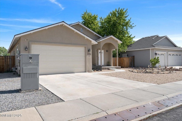 391A Bens Way, Fernley, NV 89408 - ranch-style house featuring an attached garage, concrete driveway, and stucco siding