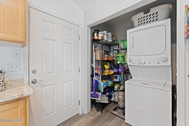 391A Bens Way, Fernley, NV 89408 - washroom featuring stacked washer and clothes dryer and light wood-style flooring