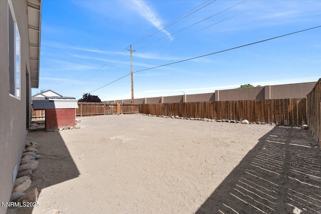 391A Bens Way, Fernley, NV 89408 - fenced backyard featuring an outdoor structure
