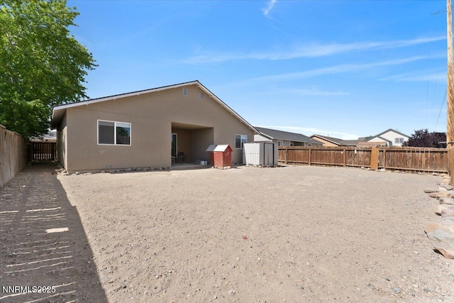 391A Bens Way, Fernley, NV 89408 - back of property with a fenced backyard and stucco siding