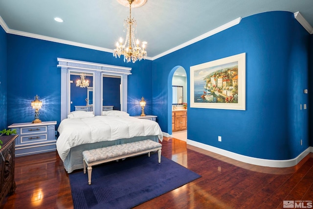 bedroom with a chandelier, crown molding, arched walkways, wood finished floors, and baseboards