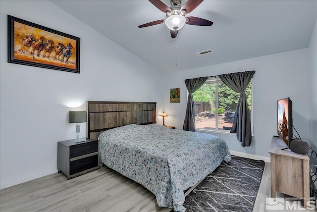 7766 Cerritos Cir, Sparks, NV 89436 - bedroom featuring vaulted ceiling, light wood finished floors, ceiling fan, and baseboards