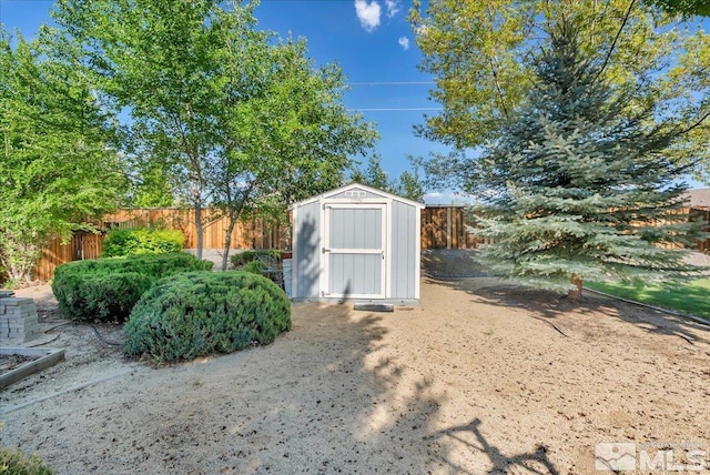7766 Cerritos Cir, Sparks, NV 89436 - view of shed featuring a fenced backyard