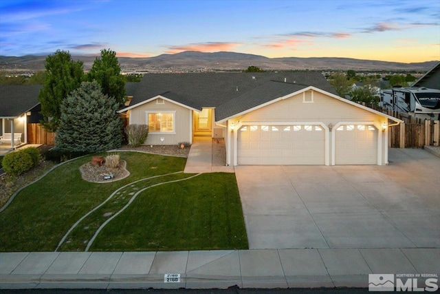 2160 Mammatus Dr, Sparks, NV 89441 - ranch-style home with a garage, a mountain view, and concrete driveway