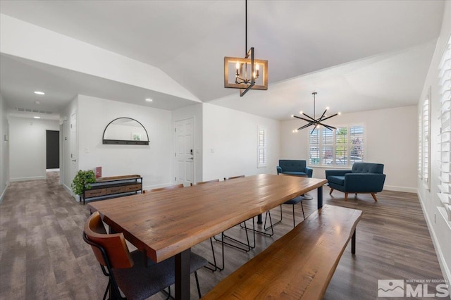 2160 Mammatus Dr, Sparks, NV 89441 - dining area with a chandelier, baseboards, lofted ceiling, wood finished floors, and recessed lighting