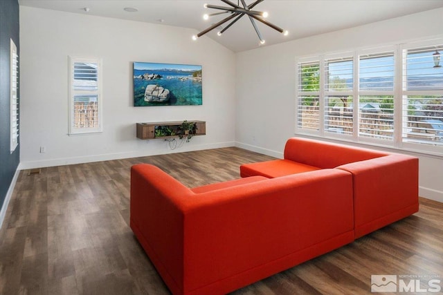 2160 Mammatus Dr, Sparks, NV 89441 - living area with a chandelier, lofted ceiling, wood finished floors, and baseboards