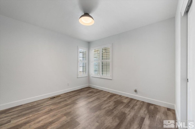 2160 Mammatus Dr, Sparks, NV 89441 - spare room with wood finished floors and baseboards