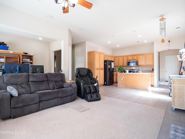 1840 Granite Chief Dr, Reno, NV 89521 - living area featuring light tile patterned floors, recessed lighting, a ceiling fan, and light colored carpet