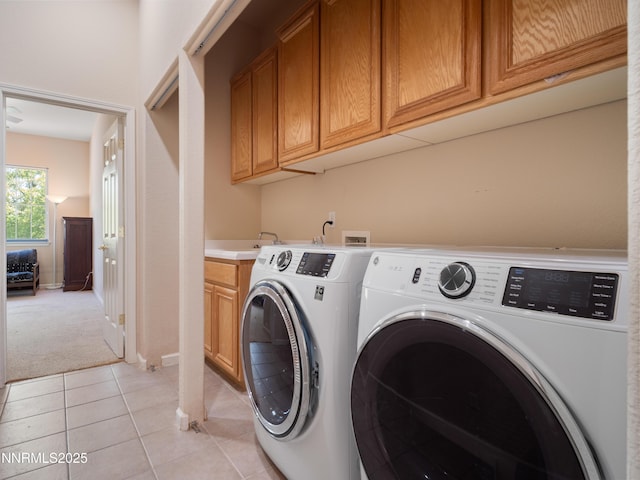 1840 Granite Chief Dr, Reno, NV 89521 - laundry area featuring washing machine and dryer, cabinet space, light colored carpet, and light tile patterned floors
