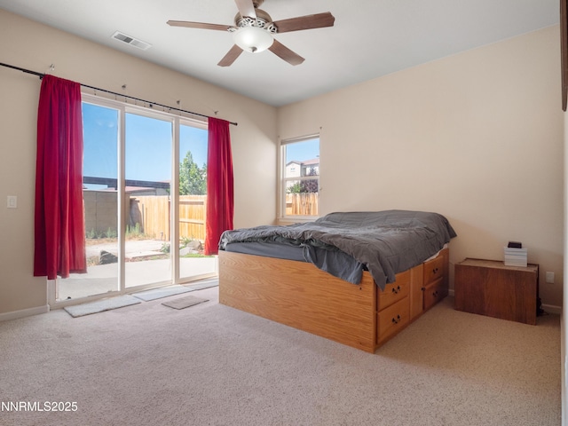 1840 Granite Chief Dr, Reno, NV 89521 - bedroom featuring access to exterior, carpet, and a ceiling fan