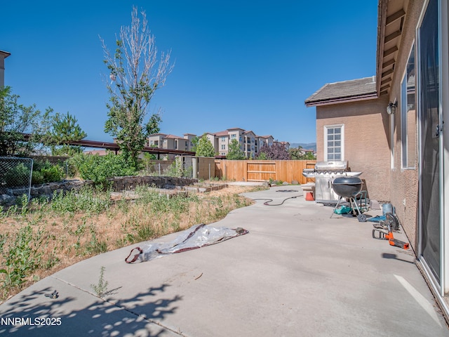 1840 Granite Chief Dr, Reno, NV 89521 - fenced backyard featuring a patio and a residential view