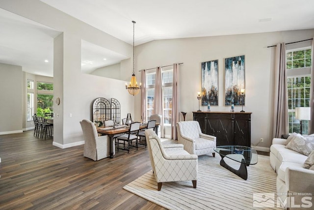 4822 Ramcreek Trl, Reno, NV 89519 - living area featuring wood finished floors, a chandelier, vaulted ceiling, baseboards, and recessed lighting