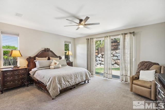 4822 Ramcreek Trl, Reno, NV 89519 - bedroom with carpet floors, access to exterior, and a ceiling fan