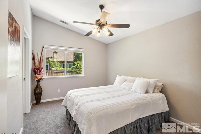 4822 Ramcreek Trl, Reno, NV 89519 - bedroom featuring carpet floors, vaulted ceiling, baseboards, and a ceiling fan
