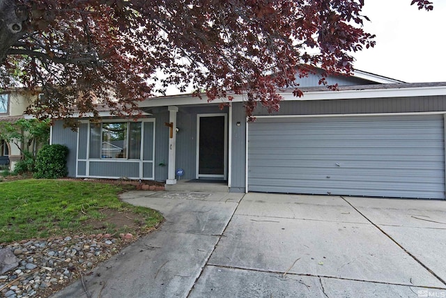 1476 Heather Ct, Sparks, NV 89434 - view of front facade featuring an attached garage and driveway