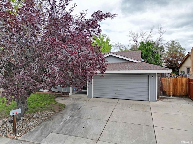 1476 Heather Ct, Sparks, NV 89434 - garage with concrete driveway and fence