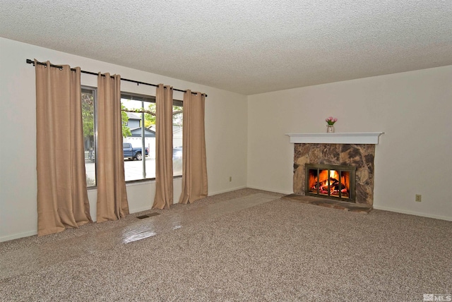 1476 Heather Ct, Sparks, NV 89434 - unfurnished living room with a textured ceiling, a fireplace, carpet, and baseboards