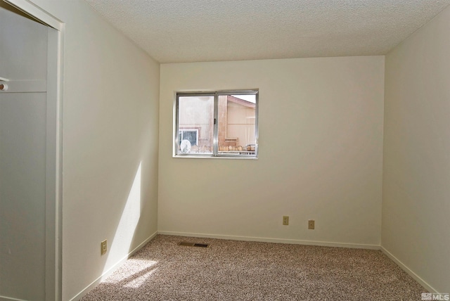1476 Heather Ct, Sparks, NV 89434 - carpeted spare room featuring a textured ceiling and baseboards