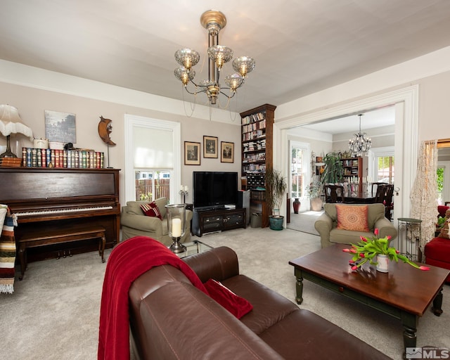 308 Thompson, Carson City, NV 89703 - living room featuring a chandelier and carpet