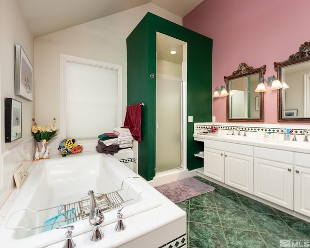 308 Thompson, Carson City, NV 89703 - full bathroom with double vanity, a shower stall, a garden tub, and lofted ceiling