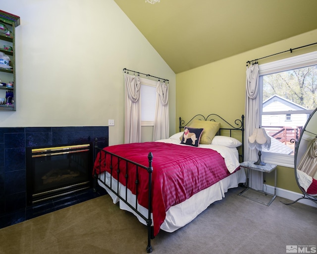 308 Thompson, Carson City, NV 89703 - bedroom featuring lofted ceiling, carpet floors, and a fireplace