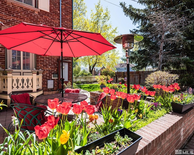 308 Thompson, Carson City, NV 89703 - view of patio with fence and a garden