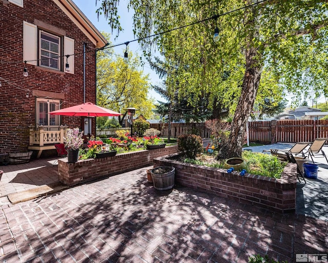 308 Thompson, Carson City, NV 89703 - view of patio with a fenced backyard