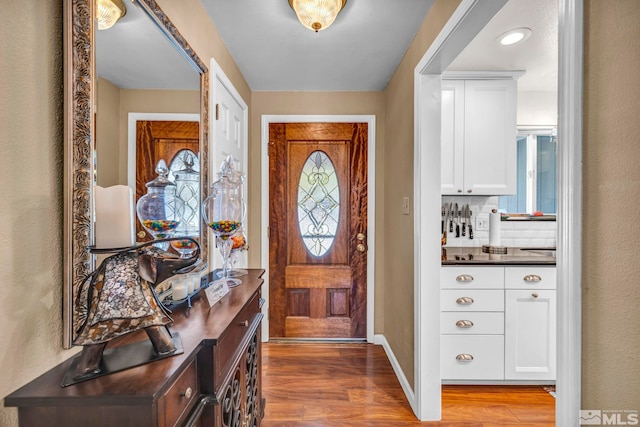 1509 Palo Verde, Carson City, NV 89703 - entryway with wood finished floors, healthy amount of natural light, and baseboards