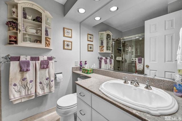 1509 Palo Verde, Carson City, NV 89703 - bathroom with recessed lighting, a shower stall, vanity, and toilet