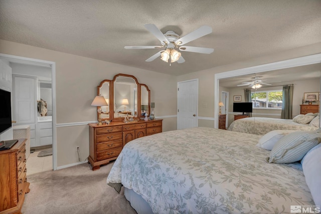 1509 Palo Verde, Carson City, NV 89703 - bedroom with light carpet, a textured ceiling, ceiling fan, baseboards, and ensuite bath