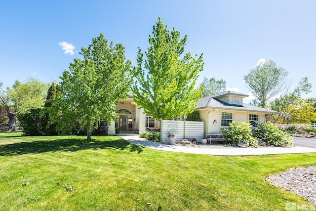 1082 Log Cabin Rd, Gardnerville, NV 89410 - rear view of property featuring a yard and stucco siding