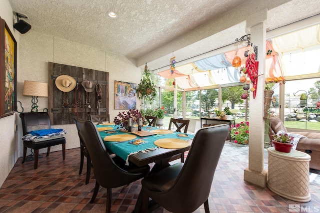 1082 Log Cabin Rd, Gardnerville, NV 89410 - dining area with a textured ceiling and a textured wall