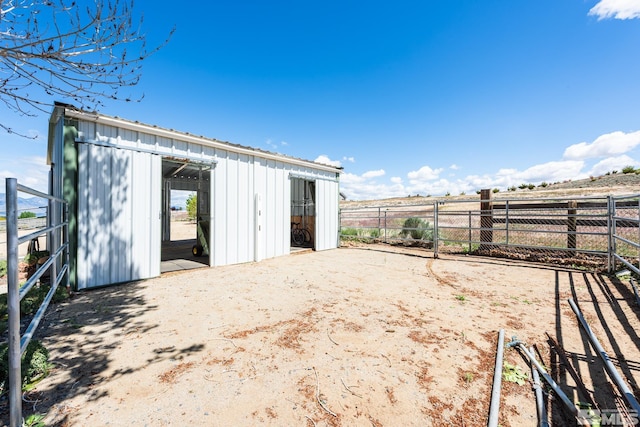 1082 Log Cabin Rd, Gardnerville, NV 89410 - view of outdoor structure with an outdoor structure, an exterior structure, and fence
