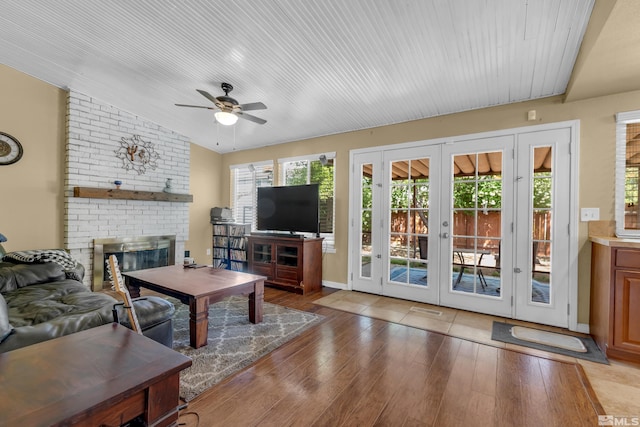 1874 Rosemary Dr, Sparks, NV 89434 - living room featuring ceiling fan, french doors, plenty of natural light, and vaulted ceiling