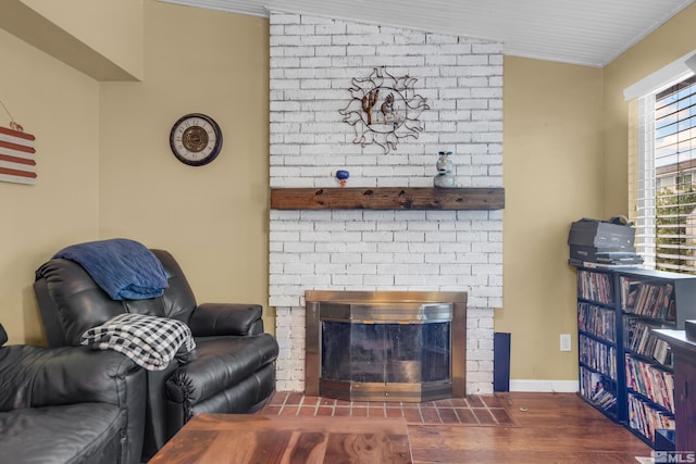 1874 Rosemary Dr, Sparks, NV 89434 - living area featuring a brick fireplace, wood finished floors, and baseboards