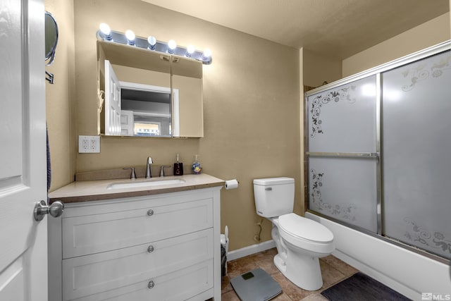 1874 Rosemary Dr, Sparks, NV 89434 - full bath featuring toilet, vanity, shower / bath combination with glass door, and baseboards